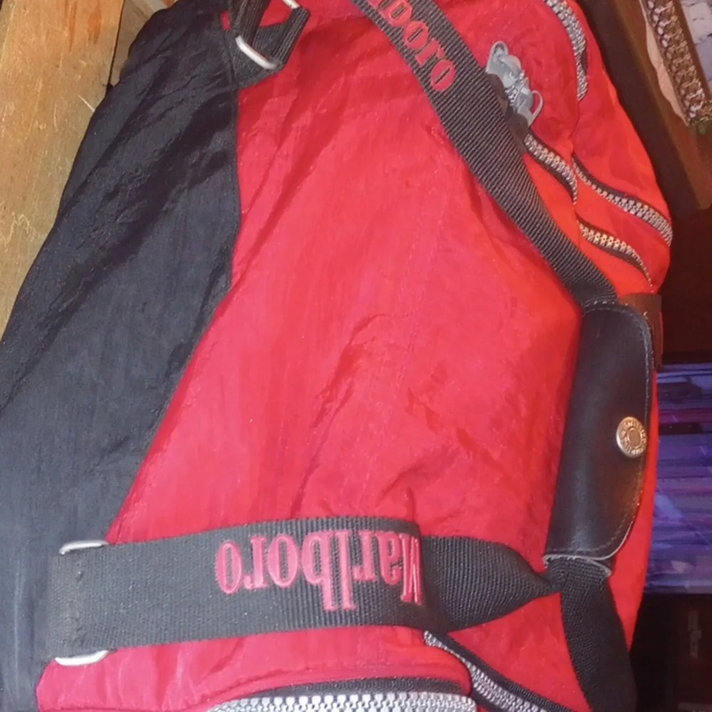 14x10 vintage Marlboro duffel bag with enough space inside and a bonus with all